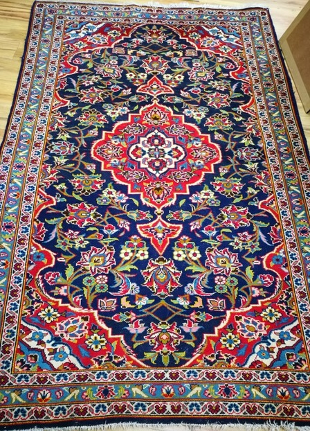 A North West Persian rug 220 x 148cm
